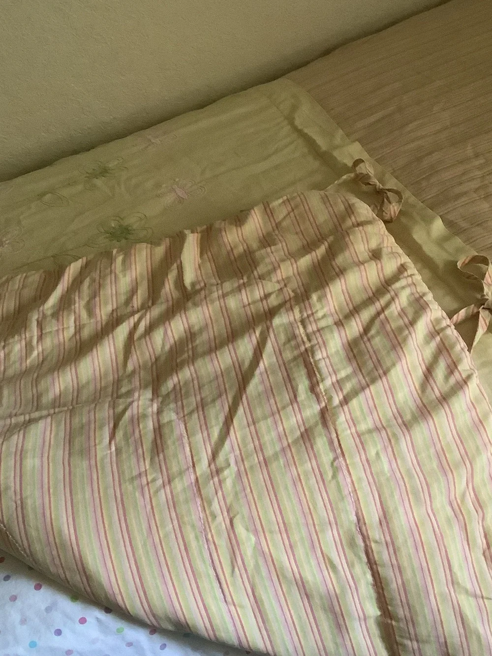 Cream Floral Embroidered Quilt with Peach Accents